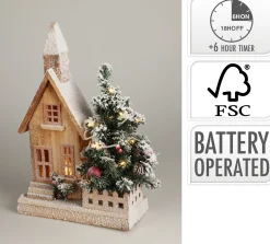 Huis met kerstboom en led